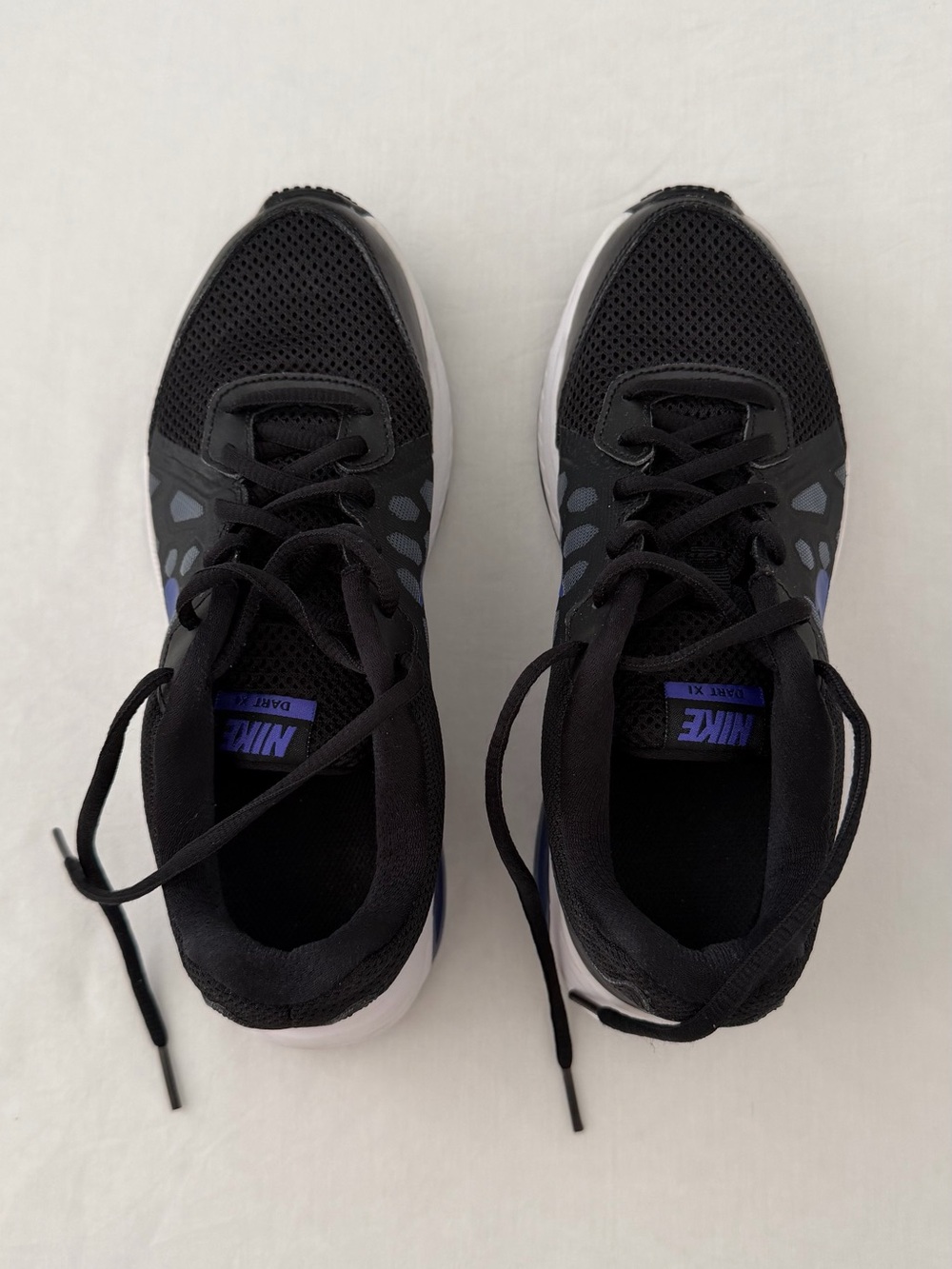 Nike Black Athletic Sneakers with Blue Accents